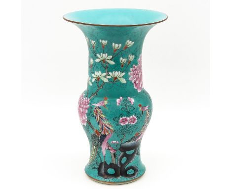 Light green ground decorated with floral blossoms and bird of paradise 39 cm. tall. 