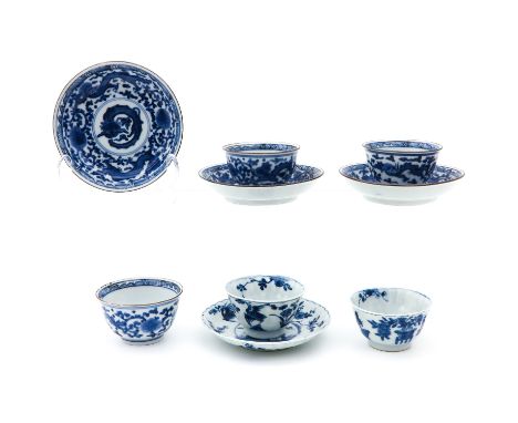 Blue and white decor, including 5 cups and 4 saucers, saucers are 12 cm. in diameter. 