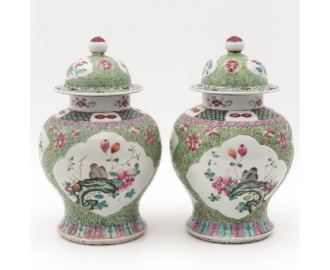 Light green ground with Famille Rose enamels depicting birds and flowers, 36 cm. tall.