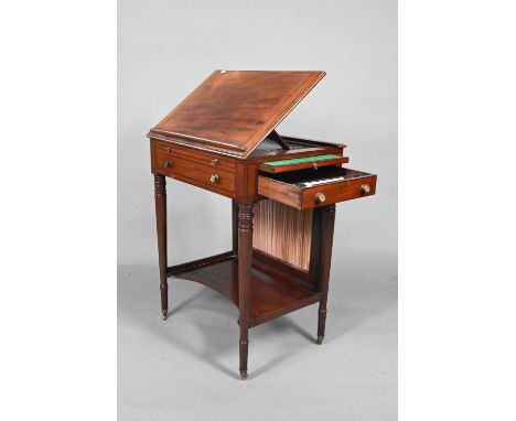 A good Regency mahogany drawing/reading/writing table, the adjustable easel top with paper rest over a pleated fabric panelle