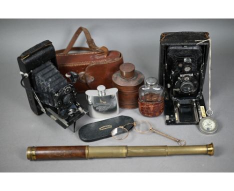 Victorian brass and mahogany three-draw pocket telescope, 40 cm extended to/w a vintage German AGC folding plate camera with 