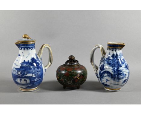 An 18th century Chinese export blue and white sparrow-beak jug and cover with moulded pomegranate finial, applied with a foli