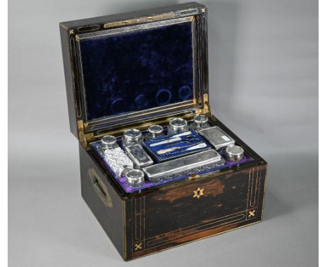 Victorian brass-inlaid coromandel dressing case, the cut glass fittings with silver tops, Thomas Whitehouse, London 1866, sur