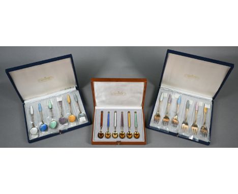 Cased set of six Anton Michelsen (Copenhagen) silver gilt coffee spoons with Harlequin enamel finials and bowls, to/w a match