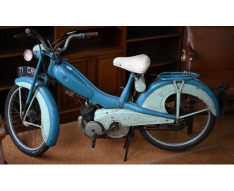 A classic Mobylette 50cc moped, registered April 1960, with registration plate 71 CRH (non transferable), complete, original,