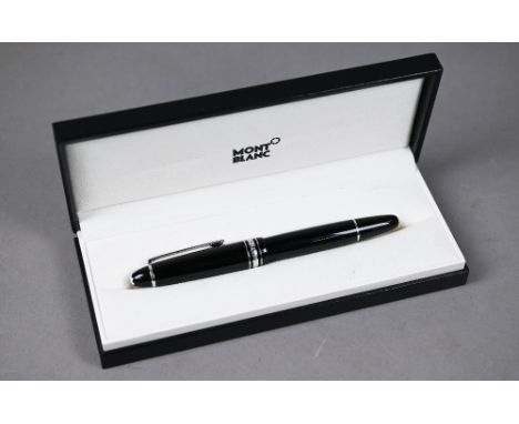 A Montblanc Meisterstuck Pix luxury rollerball pen, midsize height 14.4 cm, black precious resin screw cap and barrel with pl