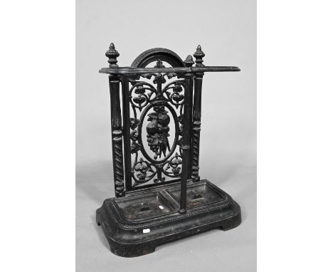 A late Victorian cast iron stick stand with twin drip pans, 50 cm w x 23 cm x 69 cm h good undamaged condition