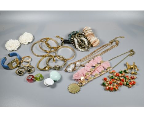 Costume jewellery including gilt metal bangles, watch bangle, bead bracelets, earrings, various designers including Ann Taylo