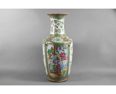 A 19th century Chinese Canton famille rose vase, late Qing dynasty, baluster form with a flared neck painted in the typical p