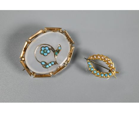A Victorian oval brooch in white chalcedony with turquoise seed pearl floral decoration and yellow metal mount (loose), 3.5 x