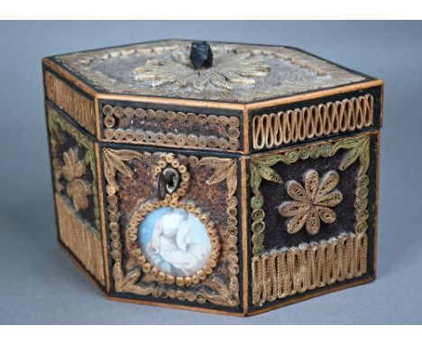 A George III tea caddy decorated with gilded rolled paper and crystal shards, and inset with two watercolours of a young lady