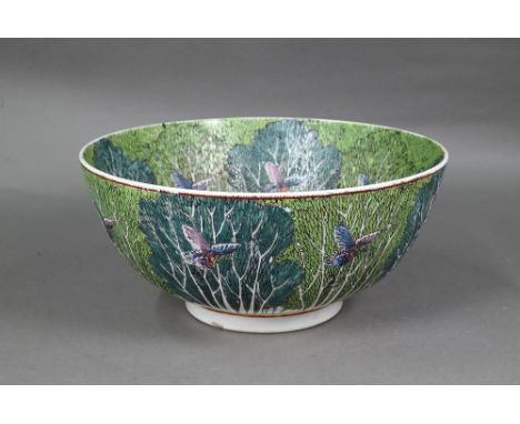 A large 19th century Chinese famille rose punch bowl, late Qing dynasty, the inside painted with large two-tone green veiny c