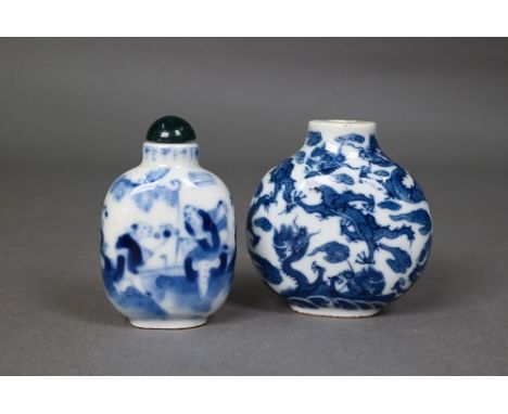 A Chinese blue and white 'dragon' snuff bottle, the flattened oval body painted in underglaze blue with dragons amongst styli