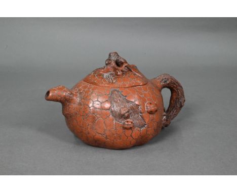 A Chinese naturalistic Yixing teapot and cover with gnarled finial and handle moulded with ladybirds on the scarred dragon sk