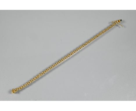 A contemporary yellow metal brick link bracelet, with concealed clasp, stamped 750, approx 8.4g to/w a lady's Rotary wristwat