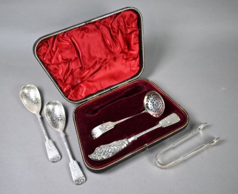 Victorian cased silver set of fiddle pattern serving flatware with foliate engraving, comprising sugar tongs, butter knife an