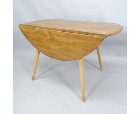 A mid-century Ercol bow-end drop leaf dining table. 113cm x 73cm x 61cm 