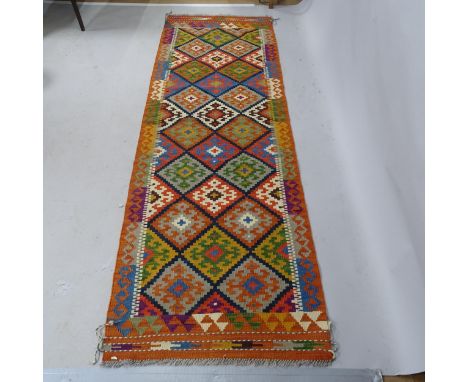 A Chobi Kilim Runner. 247cm x 81cm 