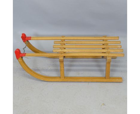 A vintage child's sledge. 79cm x 24cm x 30cm 