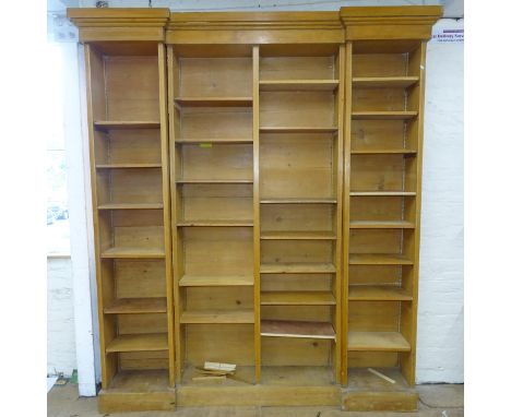 A large and impressive vintage pine three section bookcase with adjustable shelves. 210cm x 242cm x 42cm