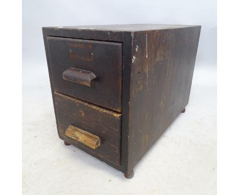 A Vintage stained pine filng chest of two drawers. 28cm x 38cm x 56cm 