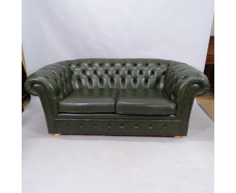 A contemporary green studded leather button back two seat chesterfield style sofa. 185cm x 76cm x 97cm WITH THE OPTION TO PUR