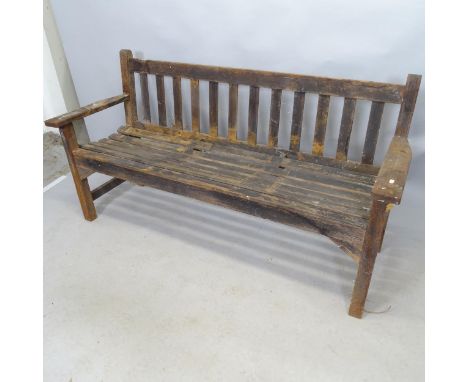 A vintage stained teak slatted garden bench. 160cm x 84cm x 60cm 