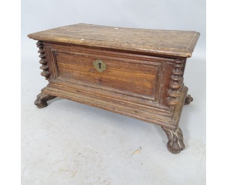 A vintage stained pine box with lifting lid raised on lion-paw feet. 53cm x 29cm x 29cm 