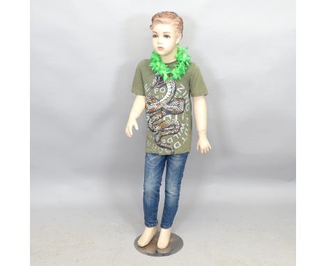 A vintage shop child mannequin. Height 117cm 