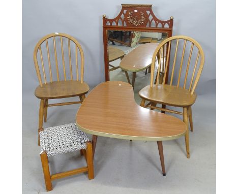 A pair of mid-century Ercol dining chairs, a coffee table of shaped form, a mirror 61cm x 106cm and a stool (5) 