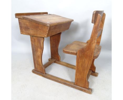 A vintage elm and pine school desk. 88cm x 82cm x 56cm 