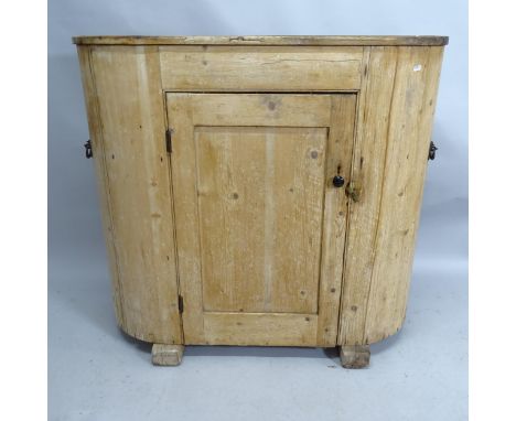 A vintage pine bow front single door cabinet with shelved interior. 110cm x 98cm x 40cm 