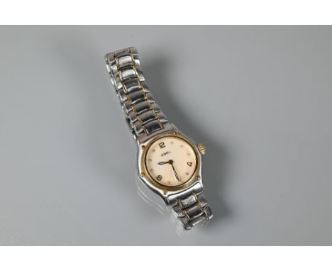 An Ebel ladies 1911 model stainless steel and 18ct gold wristwatch, the mother of pearl dial set with diamond markers, quartz