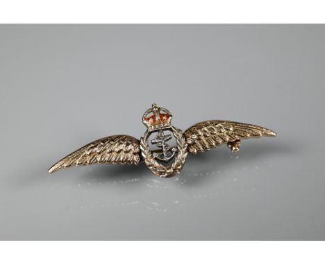 A yellow and white metal with enamel Royal Naval sweetheart badge 
