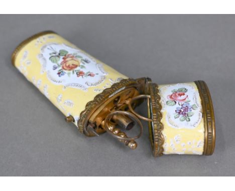 A 19th century (possibly Bilston) enamel etui with floral painted reserves on a yellow ground, with gilt metal mounts, fitted