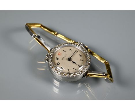 Rolex - A diamond set cocktail watch with round engine turned dial and Arabic numerals, yellow and white unmarked metal, on e
