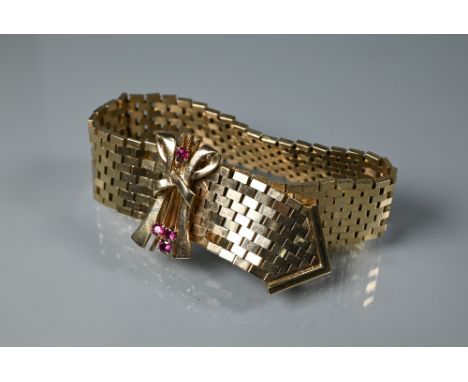 A 1960s 9ct yellow gold brick link bracelet, with ruby set centrepiece, Birmingham 1962, maker JR, approx 55.4g all in, to ma