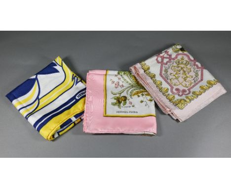 Hermes - three silk scarves with rolled edges, two pink and white traditional design, and one yellow/navy and white (3)