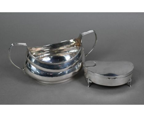A George III Irish silver sugar basin of pot-bellied elliptical form with twin handles, Joseph Jackson, Dublin 1805, 8.4oz, t