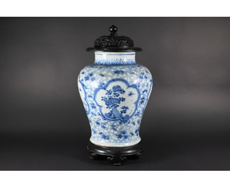 A 19th century Chinese blue and white vase or jar in the Kangxi style but late Qing dynasty, of high-shouldered baluster form