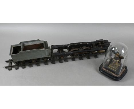 A small Victorian scratch-built vertical cylinder steam engine, 12 cm high, under a glass dome, to/w a 2" gauge 4.4.2 steam l