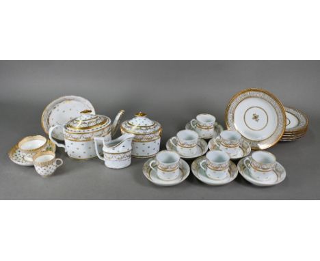 A Regency china oval teapot, covered sugar basin and milk jug with gilt decoration and six matching cylindrical tea cups with