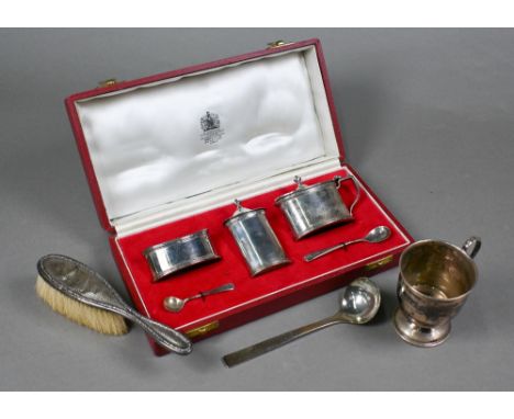 A cased heavy quality silver three-piece condiment set with spoons and blue glass liners, B Chatterley &amp; Sons Ltd (Asprey