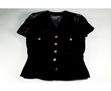 Chanel Boutique - a vintage black velvet short sleeved evening top with jewelled enamel and gilt buttons, size 8 No signs of 