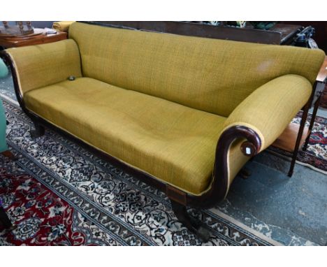 A Regency period faux rosewood framed brass-mounted scroll arm sofa, with lyre ends, well upholstered in contemporary heavy g