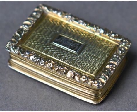 A George IV silver gilt vinaigrette with engine turning within floral-chased borders, interior with foliate-pierced grill, Na