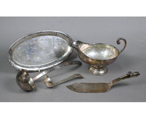 A Mexican silver sauce boat and ladle, stamped 'Sterling', to/w a punch ladle, a pastry slice and an oval dish, all with simi