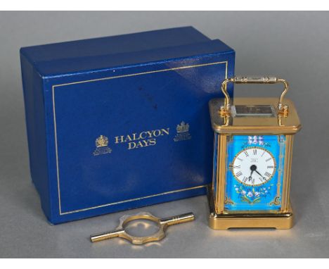 A boxed Halcyon Days carriage clock with blue enamel panels, 10 cm high