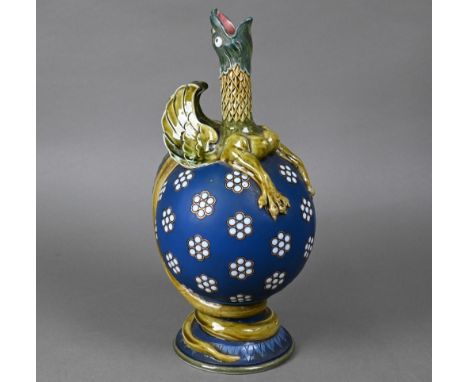 A Villeroy & Boch (Mettlach) novelty jug/vase the spout and handle modelled as a gryphon with outstretched neck, mounted on a