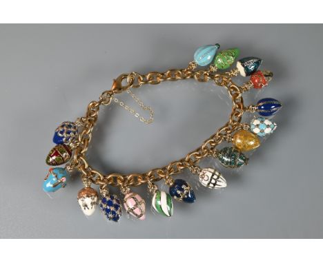 A modern gilt metal chain with multi-coloured enamel egg charms 'Secrets of the heart', by the Bradford Exchange (cased)